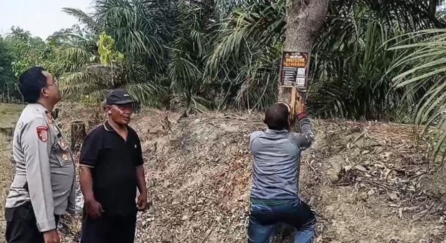 Wujudkan Zona Zero Asap, Polsek Buay Madang Timur Patroli dan Pasang Spanduk Karhutla di Tambak Boyo