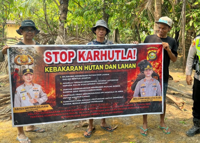 Polsek Belitang I OKU Timur Pasang Spanduk Larangan dan Sebar Maklumat di Tiga Desa
