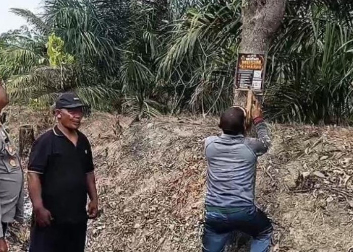 Wujudkan Zona Zero Asap, Polsek Buay Madang Timur Patroli dan Pasang Spanduk Karhutla di Tambak Boyo