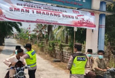 Polsek Madang Suku II Bagikan Masker Gratis di Sekolah, Antisipasi Kabut Asap Karhutla