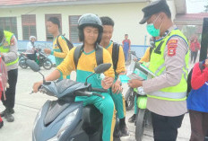 Polsek Madang Suku II Bagikan Masker Gratis di Sekolah, Antisipasi Kabut Asap Karhutla