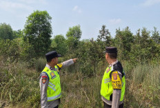 Lacak Titik Hotspot, Polsek Madang Suku I Temukan Kebakaran Rawa Gambut di OKU Timur