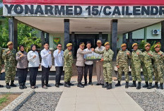 Peringati HUT TNI Ke-81, Kabag Logistik dan Kasat Resnarkoba Polres OKU Timur Beri Kejutan di Yon Armed 15/105